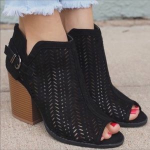 Black faux suede cut out ankle booties.